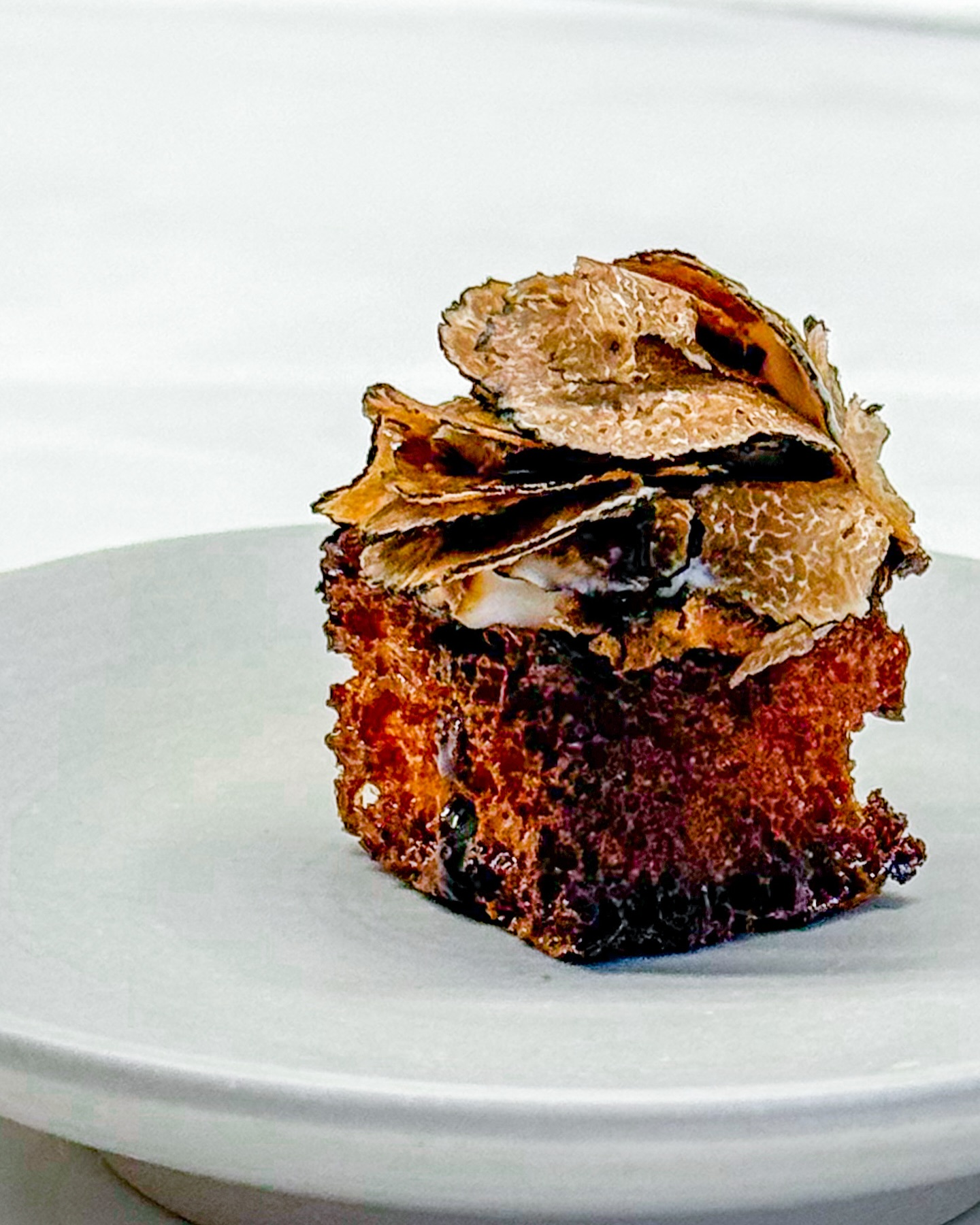 🏆 My humble take on the Frantzén French Toast

What do you think of this bite? It’s inspired by one of @bjornfrantzen ‘s most iconic dishes. I’ve been so incredibly lucky to have enjoyed the real deal @restaurantfrantzen a couple of weeks ago 🤩 

My version won’t stand a chance next to the original but hey; it’s my first attempt. I really enjoyed making & tasting it! I didn’t manage to put the truffle on it the way it should be; they make it look easy but it really takes a lot of practice…

Anyway; there’s toasted sourdough bread, filled with shallot cream. On top cream of Parmigiano Reggiano, some 25yo balsamic vinegar and beautiful thinly sliced autumn truffle 🍄‍🟫 

#frantzen #parmigianoreggiano #balsamico #truffle #toast #frenchtoast #michelin #threestarsmichelin